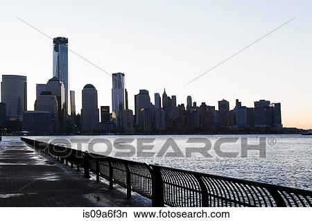 Picture - Manhattan waterfront and skyline at dusk, New York City, USA. Fotosearch