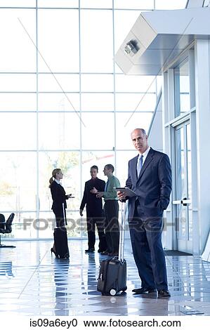 Mature businessman with digital table View Large Photo Image Stock Image - Mature businessman with digital table. Fotosearch