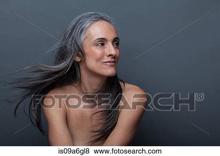 Mature woman with windswept hair View Large Photo Image Stock Photo - Mature woman with windswept hair. Fotosearch