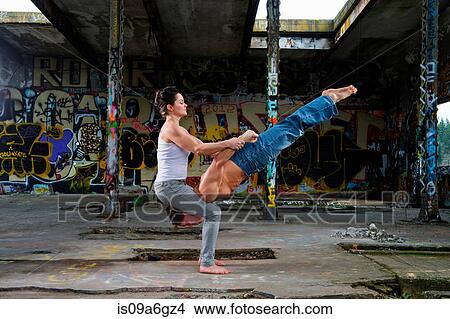 Picture - Mid adult couple performing modern dance. Fotosearch