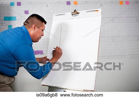 Mid adult man giving presentation View Large Photo Image Stock Photo - Mid adult man giving presentation. Fotosearch