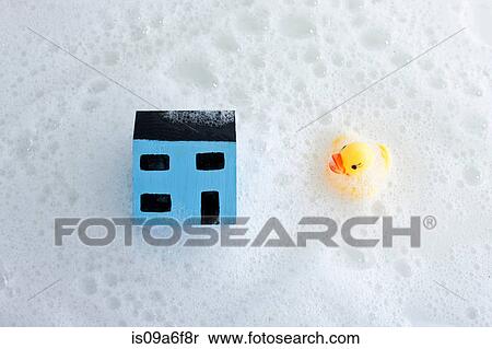 Model house and rubber duck in bath View Large Photo Image Stock Photography - Model house and rubber duck in bath. Fotosearch