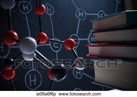 Stock Photography - Molecular model and books. Fotosearch