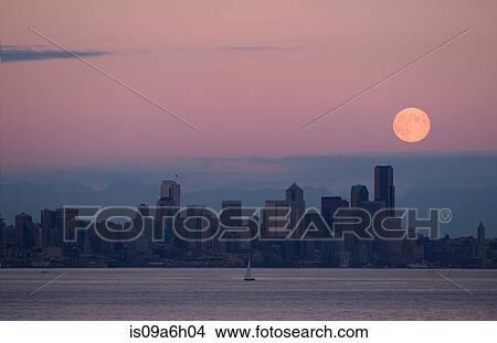 Picture - Moon over skyline, Seattle, USA. Fotosearch