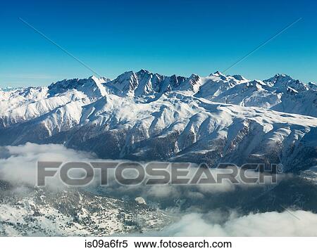 Mountains in snow with cloud View Large Photo Image Stock Photography - Mountains in snow with cloud. Fotosearch