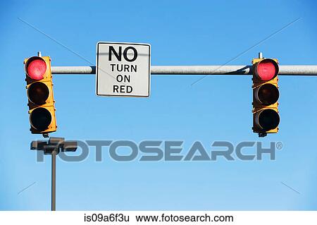 Stock Photograph - No turn sign at red traffic lights. Fotosearch