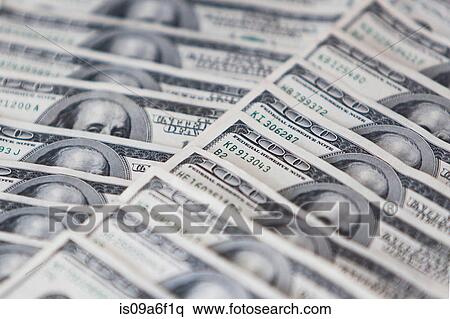 Stock Photography - One hundred dollar bills. Fotosearch