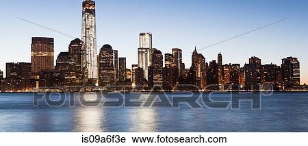 Stock Image - Panoramic Manhattan skyline at dusk, New York City, USA. Fotosearch