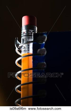 Pencil in spiral bound notebook View Large Photo Image Picture - Pencil in spiral bound notebook. Fotosearch
