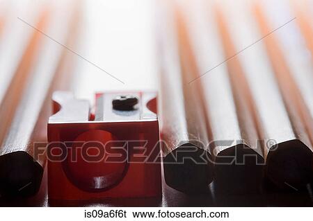 Pencils and pencil sharpener View Large Photo Image Stock Photograph - Pencils and pencil sharpener. Fotosearch