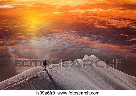 Person on mountain at sunset, Piz Palu, St Moritz, Canton Graubunden, Switzerland View Large Photo Image Stock Photo - Person on mountain at sunset, Piz Palu, St Moritz, Canton Graubunden, Switzerland. Fotosearch