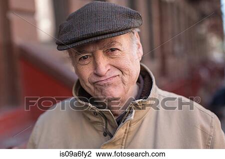 Stock Image - Portrait of senior man in street. Fotosearch