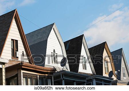 Stock Image - Row of clapboard houses, Brooklyn, New York City, USA. Fotosearch