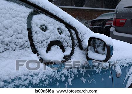 Sad face drawn in snow on car window View Large Photo Image Stock Image - Sad face drawn in snow on car window. Fotosearch