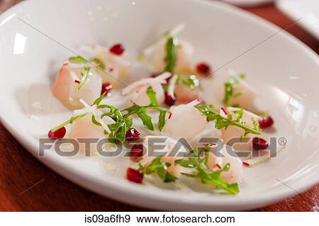 Scallops on dish View Large Photo Image Stock Photo - Scallops on dish. Fotosearch