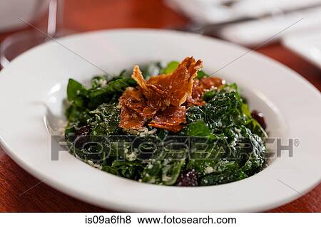 Stock Photo - Side dish with garnish. Fotosearch
