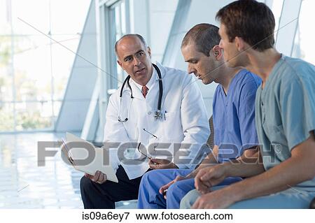 Three male doctors View Large Photo Image Stock Photo - Three male doctors. Fotosearch