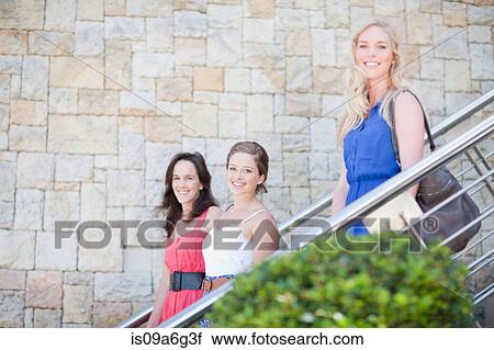 Stock Image - Three young women. Fotosearch