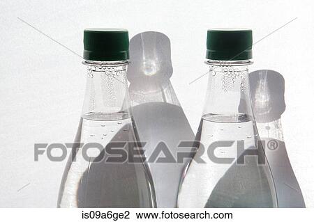 Stock Image - Two bottles of mineral water. Fotosearch
