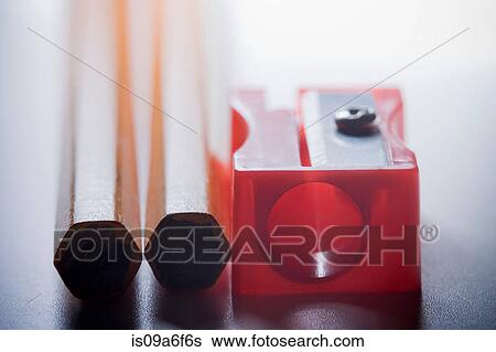 Two pencils and pencil sharpener View Large Photo Image Stock Photograph - Two pencils and pencil sharpener. Fotosearch