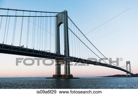 Stock Photo - Verrazano-narrows bridge at sunrise, New York City, USA. Fotosearch