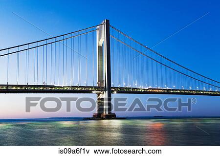 Stock Photo - Verrazano-narrows bridge at sunset, New York City, USA. Fotosearch
