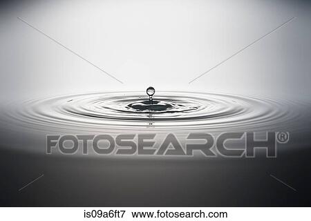 Water droplet falling into water View Large Photo Image Stock Photo - Water droplet falling into water. Fotosearch