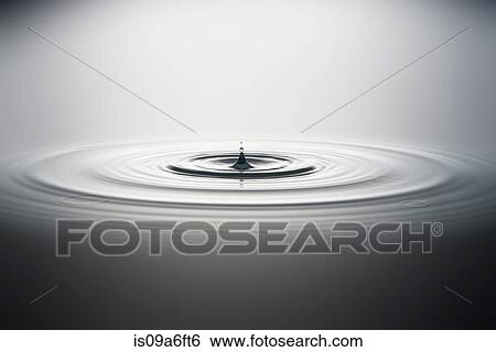 Water droplet falling into water View Large Photo Image Stock Photograph - Water droplet falling into water. Fotosearch