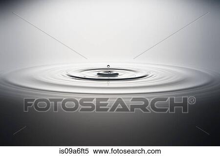 Water droplet falling into water View Large Photo Image Stock Photography - Water droplet falling into water. Fotosearch