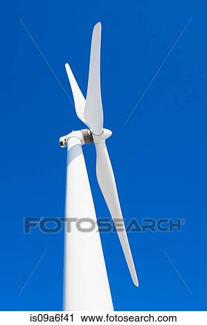 Stock Image - Wind turbine and blue sky. Fotosearch