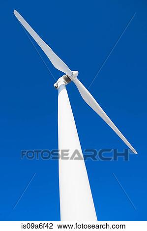 Wind turbine and blue sky View Large Photo Image Stock Image - Wind turbine and blue sky. Fotosearch