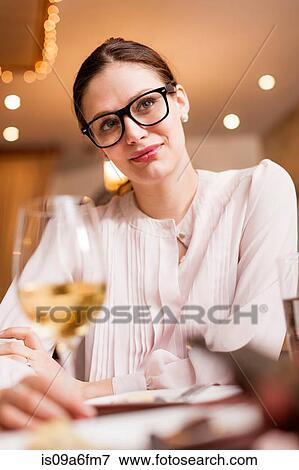 Stock Photo - Woman having a drink. Fotosearch