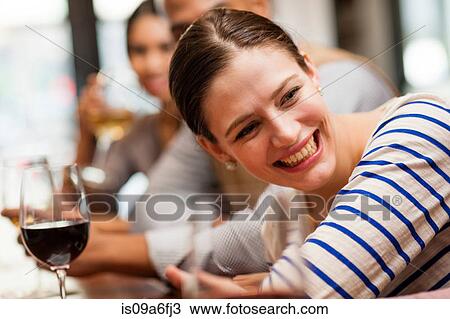 Woman leaning forward on bar View Large Photo Image Stock Image - Woman leaning forward on bar. Fotosearch