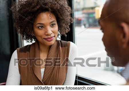 Woman looking intently at man View Large Photo Image Stock Image - Woman looking intently at man. Fotosearch