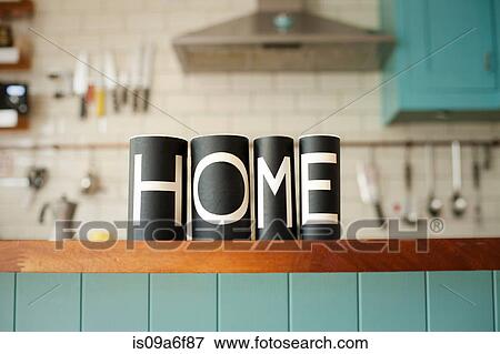 Word 'Home' on kitchen counter View Large Photo Image Stock Photo - Word 'Home' on kitchen counter. Fotosearch