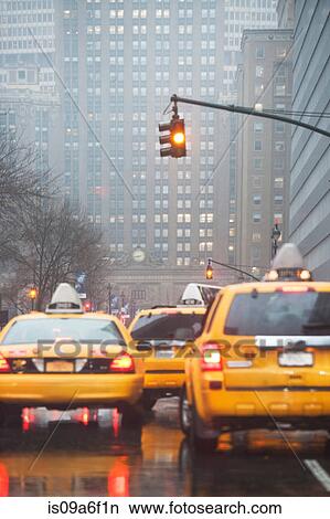 Picture - Yellow cabs at traffic lights, New York City, USA. Fotosearch
