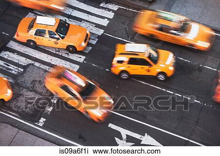 Stock Image - Yellow taxi cabs, New York City, USA. Fotosearch