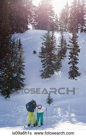 Stock Photograph - Young couple at Brighton ski resort, Utah, USA. Fotosearch