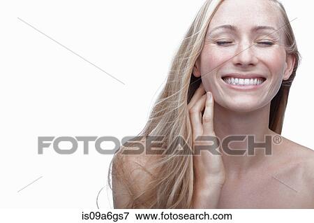 Young woman touching neck View Large Photo Image Stock Photo - Young woman touching neck. Fotosearch
