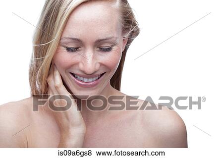 Young woman touching neck View Large Photo Image Stock Photo - Young woman touching neck. Fotosearch