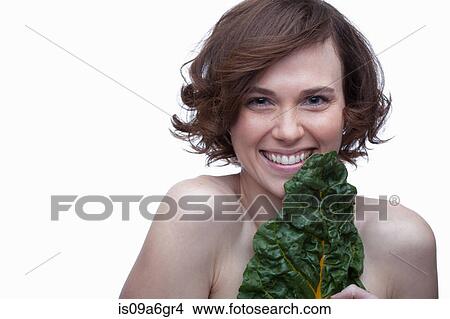 Picture - Young woman with chard. Fotosearch