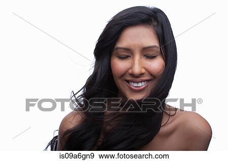 Stock Photo - Young woman with eyes closed. Fotosearch