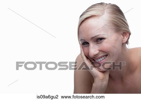 Stock Image - Young woman with hand on chin. Fotosearch
