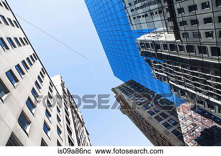 Angled view of old and modern office buildings View Large Photo Image Stock Image - Angled view of old and modern office buildings. Fotosearch