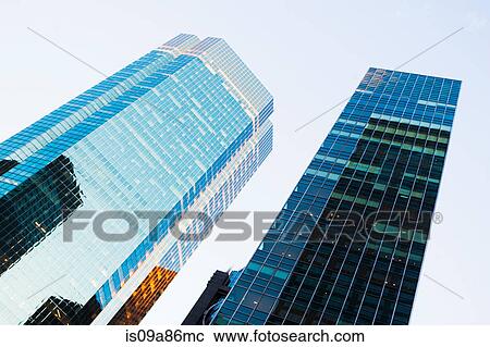 Angled view of skyscrapers View Large Photo Image Stock Image - Angled view of skyscrapers. Fotosearch