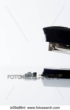 Anthopomorphic stapler and staples View Large Photo Image Stock Photograph - Anthopomorphic stapler and staples. Fotosearch