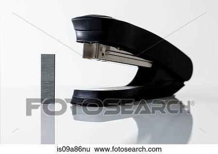 Anthopomorphic stapler and staples View Large Photo Image Stock Photograph - Anthopomorphic stapler and staples. Fotosearch