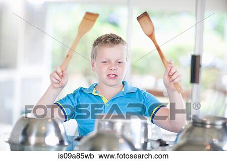 Boy pretending to be drummer View Large Photo Image Stock Image - Boy pretending to be drummer. Fotosearch
