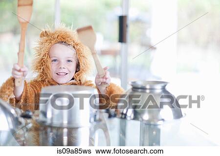 Boy pretending to be drummer View Large Photo Image Stock Photograph - Boy pretending to be drummer. Fotosearch