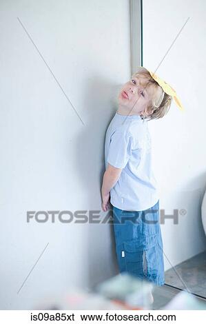 Stock Photograph - Boy sticking out his tongue. Fotosearch